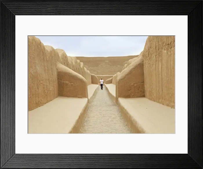 Framed Print : South America, Peru, La Libertad, Trujillo, a tourist walks along a corridor in Framed Print : South America, Peru, La Libertad, Trujillo, a tourist walks along a corridor in