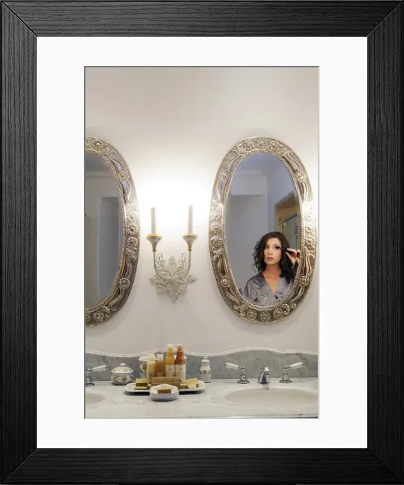 Framed Print : South America, Peru, Cusco, a model puts on make-up in the bathroom of the palacio Framed Print : South America, Peru, Cusco, a model puts on make-up in the bathroom of the palacio