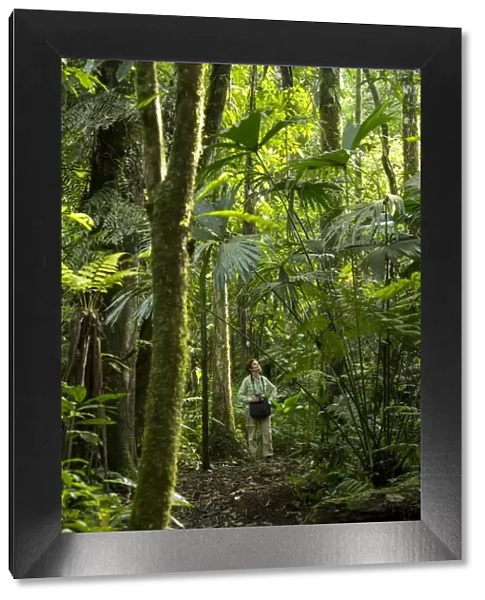 South America, Peru, Manu National Park, woman in rain forest, MR 0009