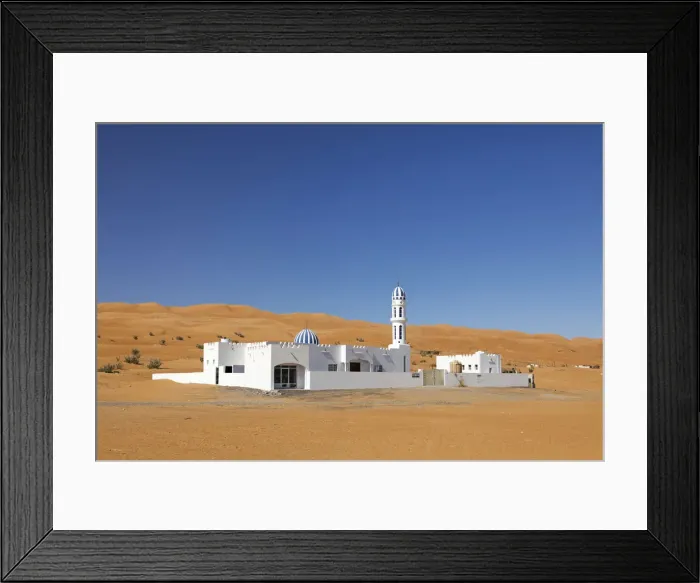 Framed Print : A colourful mosque stands in front of sand dunes at the edge of the desert, Wahiba sands Framed Print : A colourful mosque stands in front of sand dunes at the edge of the desert, Wahiba sands