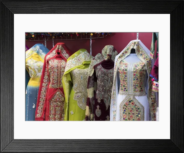 Framed Print : Ornate dresses for sale in Mutrah souk, Muscat, Oman