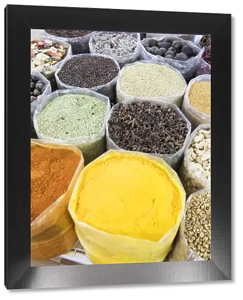 Oman, Ad Dakhiliyah Governorate, Nizwa, colourful spices for sale at the souk in Nizwa