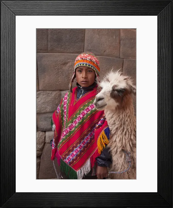 Framed Print : South America, Peru, Cusco. A Quechua boy in a poncho and a chullo woollen cap with
