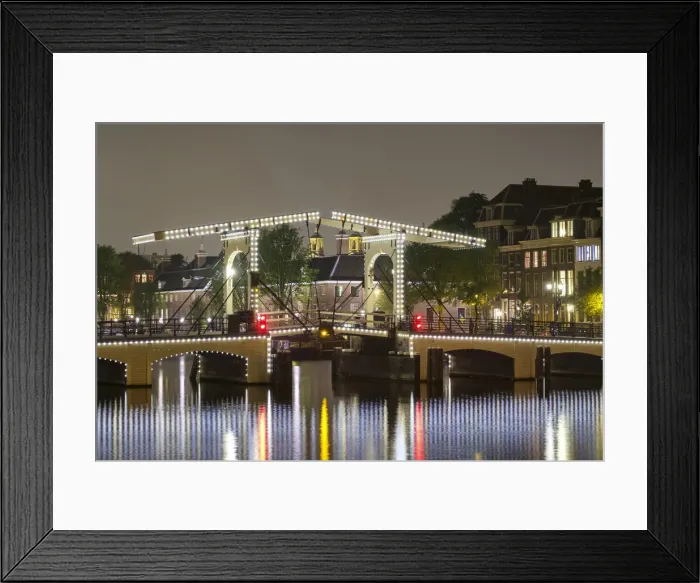 Framed Print : Magere Brug over the river Amstel illuminated at night, Amsterdam, North Holland Framed Print : Magere Brug over the river Amstel illuminated at night, Amsterdam, North Holland