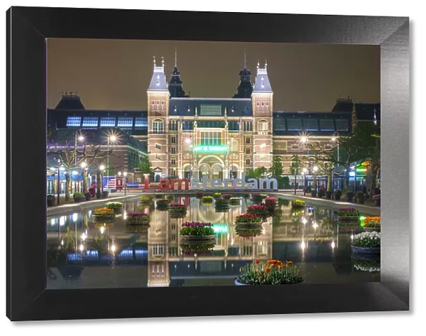 Rijksmuesum and Museumplein illuminiated at night, Amsterdam, North Holland, Netherlands