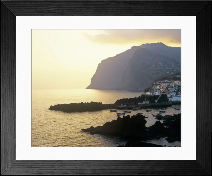 Framed Print : The fishing harbour of Camara de Lobos and Girao Cape at sunset, Madeira, Portugal Framed Print : The fishing harbour of Camara de Lobos and Girao Cape at sunset, Madeira, Portugal