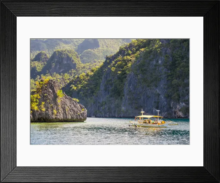 Framed Print : Outrigger boat anchored at Twin Peaks Reef off the coast of Coron Island, Coron, Palawan Framed Print : Outrigger boat anchored at Twin Peaks Reef off the coast of Coron Island, Coron, Palawan