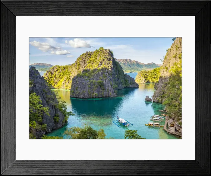 Framed Print : Outrigger boats and small village in a rocky inlet on Coron Island, Coron, Palawan Framed Print : Outrigger boats and small village in a rocky inlet on Coron Island, Coron, Palawan