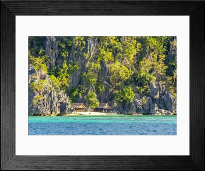 Framed Print : Small huts against dramatic karst cliffs on Coron Island, Palawan, Philippines Framed Print : Small huts against dramatic karst cliffs on Coron Island, Palawan, Philippines