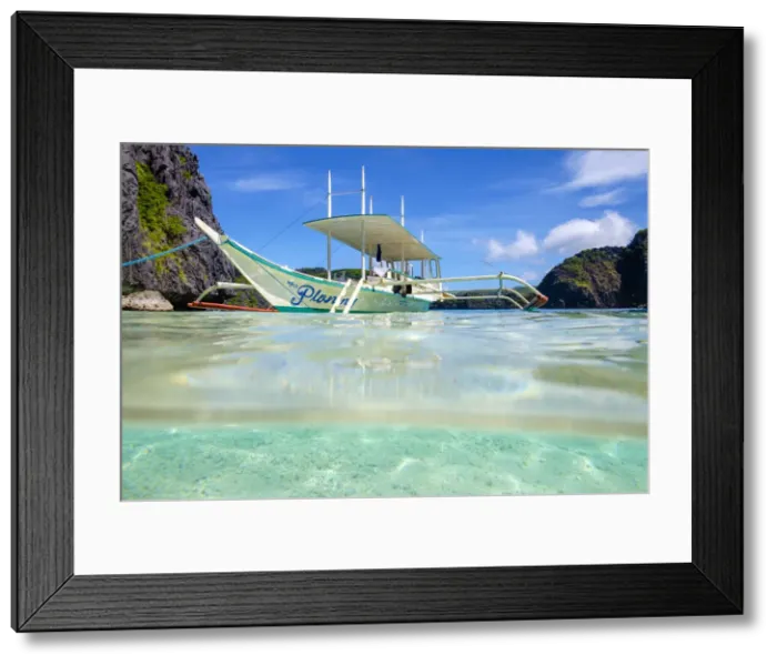 Framed Print : Outrigger boat anchored at Talisay Beach, Tapiutan Island, El Nido, Palawan, Philippines Framed Print : Outrigger boat anchored at Talisay Beach, Tapiutan Island, El Nido, Palawan, Philippines