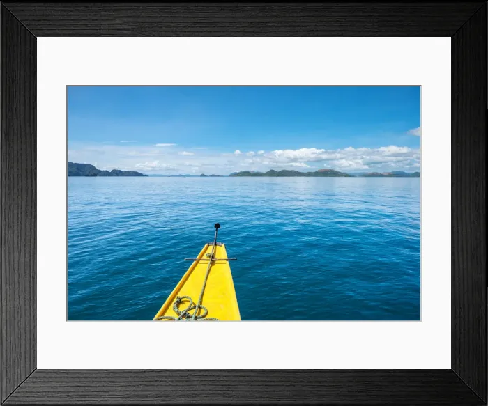 Framed Print : Bow of an outrigger boat on blue water in Hidden Lagoon, Coron Island, Palawan Framed Print : Bow of an outrigger boat on blue water in Hidden Lagoon, Coron Island, Palawan