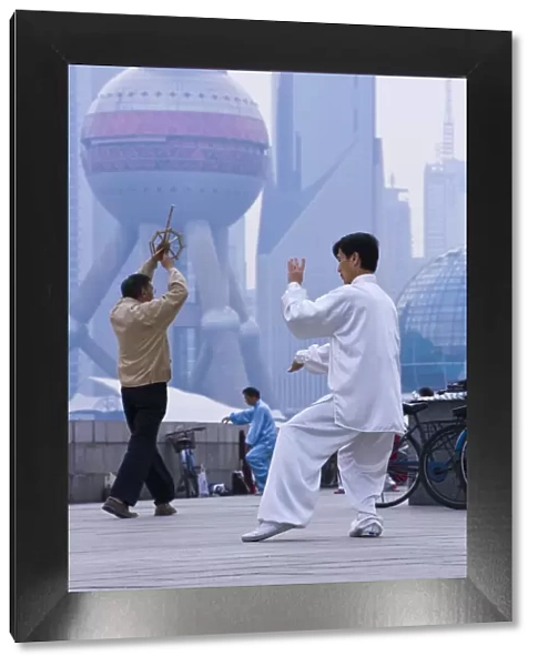 China, Shanghai, morning exercises  /  Tai Chi in Huangpu Park on the Bund, Pudong in