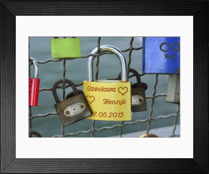 Framed Print : Lovers padlocks. This bridge is full of padlocks which lovers leave; an important Framed Print : Lovers padlocks. This bridge is full of padlocks which lovers leave; an important