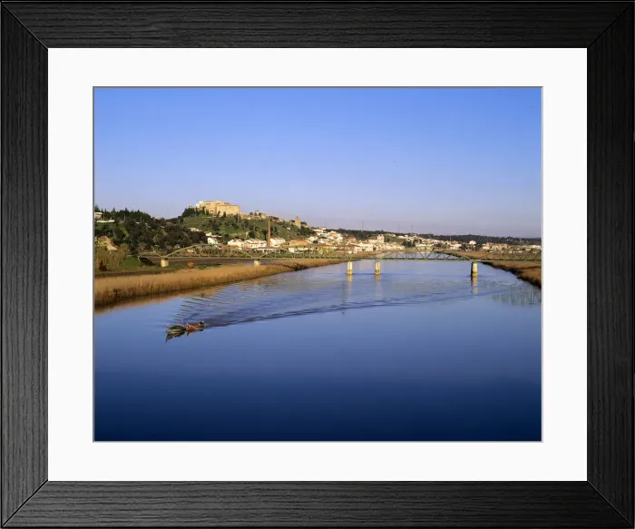 Framed Print : The Sado river crossing Alcacer do Sal, one of the oldest villages in Europe, founded Framed Print : The Sado river crossing Alcacer do Sal, one of the oldest villages in Europe, founded
