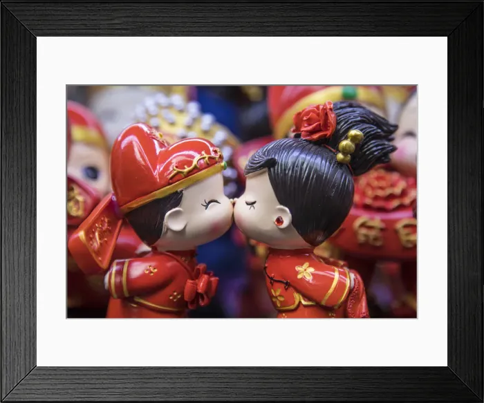 Framed Print : Boy and girl ornaments kissing, Old City market, Shanghai, China