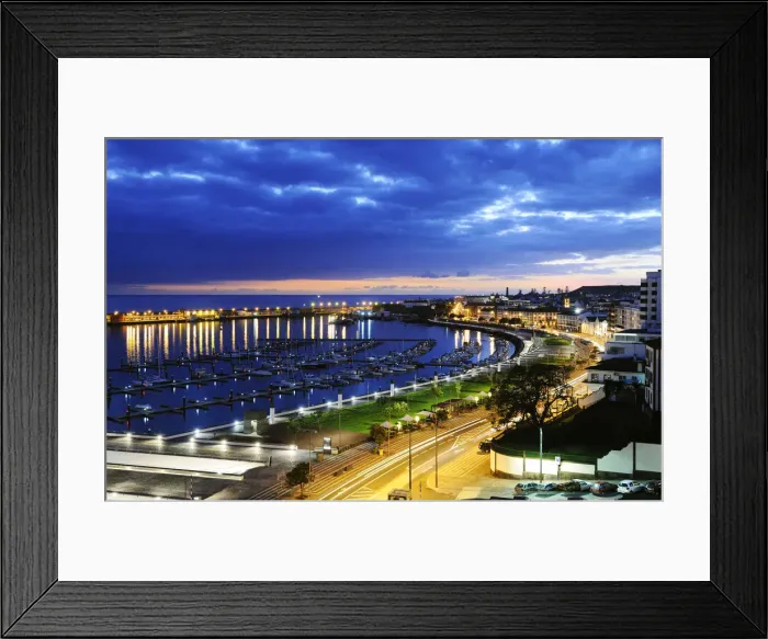 Framed Print : Seaside main avenue, marina and harbour of Ponta Delgada in twilight