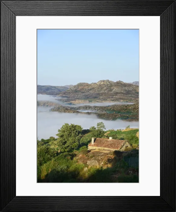Framed Print : The fog surrounding the old and traditional village of Pitoes das Junias