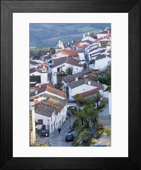 Framed Print : Europe, Portugal, Alentejo, Portalegre, Marvao village - a man walking along a cobbled Framed Print : Europe, Portugal, Alentejo, Portalegre, Marvao village - a man walking along a cobbled
