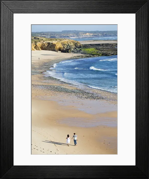 Framed Print : Europe, Portugal, Alentejo, Vila Nova de Milfontes, a young couple on praia carreiro Framed Print : Europe, Portugal, Alentejo, Vila Nova de Milfontes, a young couple on praia carreiro