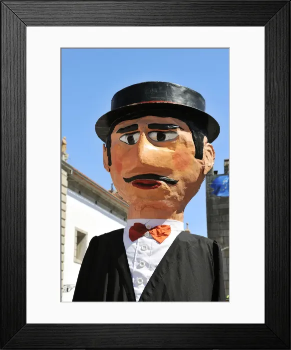 Framed Print : Traditional big-headed masks of Minho at the historical centre of Viana do Castelo Framed Print : Traditional big-headed masks of Minho at the historical centre of Viana do Castelo