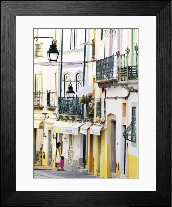Framed Print : Portugal, Alentejo, EvoraWoman and girl looking in shop window (MR) Framed Print : Portugal, Alentejo, EvoraWoman and girl looking in shop window (MR)