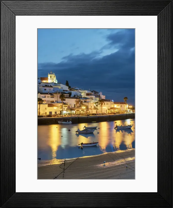Framed Print : The traditional fishing village of Ferragudo at dusk. Algarve, Portugal Framed Print : The traditional fishing village of Ferragudo at dusk. Algarve, Portugal