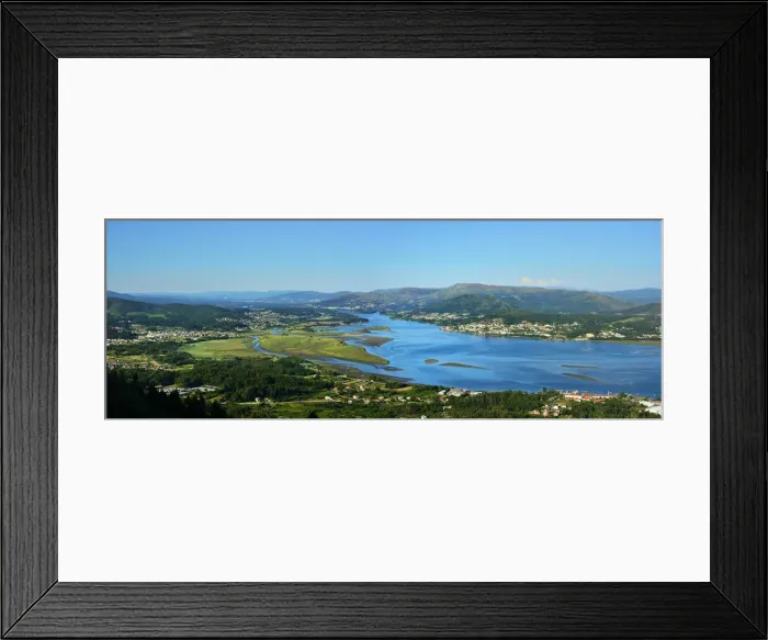 Framed Print : Minho river between Portugal and Spain. Portugal on the background and spanish Galicia Framed Print : Minho river between Portugal and Spain. Portugal on the background and spanish Galicia