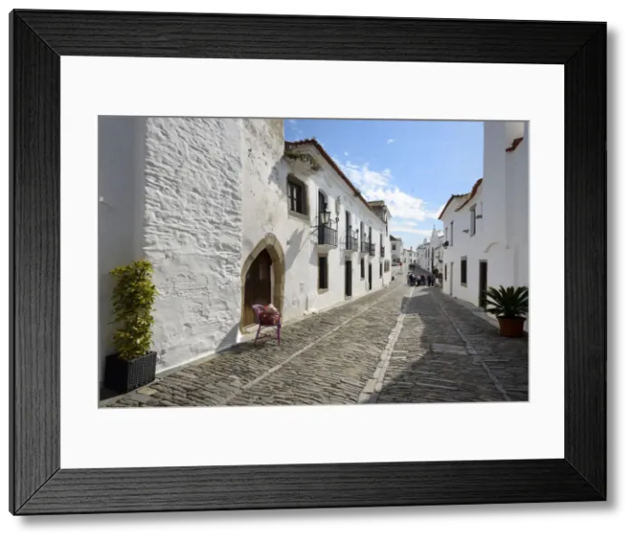 Framed Print : The white washed houses of the historic village of Monsaraz. Alentejo, Portugal Framed Print : The white washed houses of the historic village of Monsaraz. Alentejo, Portugal