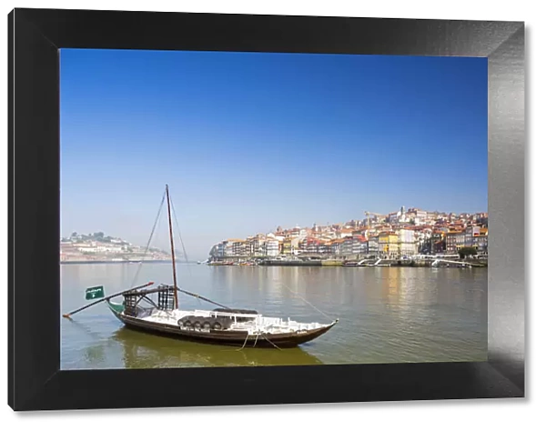 Portugal, Douro Litoral, Porto. The view across the Douro River to the UNESCO listed
