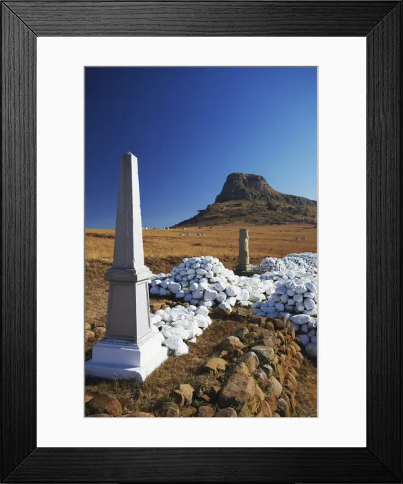 Framed Print : White stone cairns and memorials to British soldiers at Isandlwana, Thukela, KwaZulu-Natal