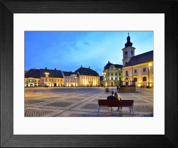 Framed Print : Moment of peace. Piata Mare and the Holy Trinity Roman Catholic Church at dusk. Sibiu Framed Print : Moment of peace. Piata Mare and the Holy Trinity Roman Catholic Church at dusk. Sibiu