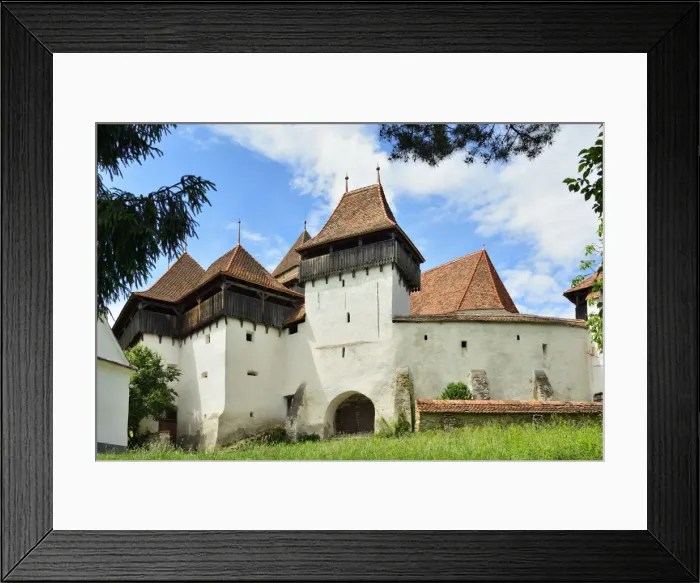 Framed Print : The Viscri fortified church was built by the Transylvanian Saxon community in Viscri Framed Print : The Viscri fortified church was built by the Transylvanian Saxon community in Viscri
