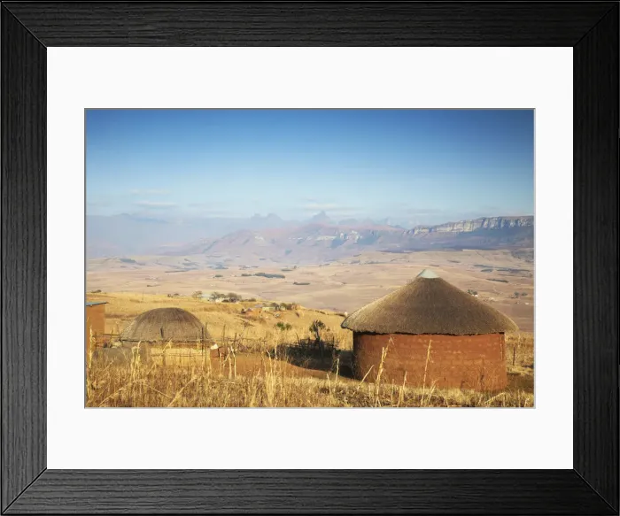 Framed Print : Village huts with Cathedral Peak in background, Ukhahlamba-Drakensberg Park, KwaZulu-Natal Framed Print : Village huts with Cathedral Peak in background, Ukhahlamba-Drakensberg Park, KwaZulu-Natal