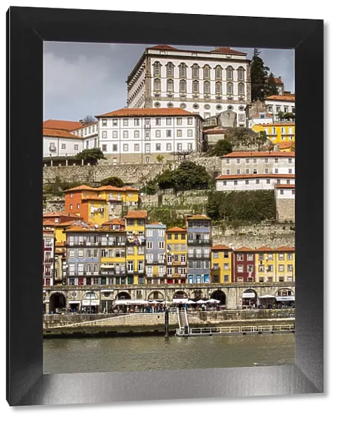 View over the colorful buildings of Ribeira district and Episcopal Palace, Porto