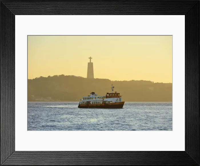 Framed Print : A traditional passenger boat (cacilheiro) crossing the Tagus river between Almada Framed Print : A traditional passenger boat (cacilheiro) crossing the Tagus river between Almada