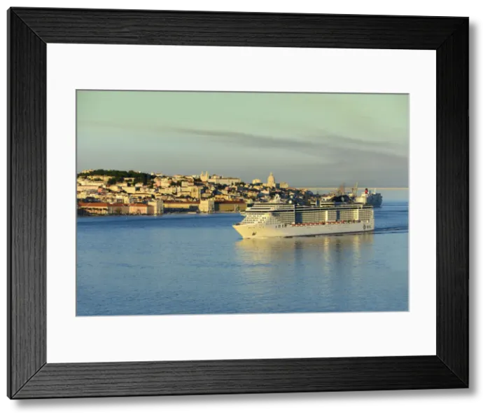 Framed Print : A cruise ship in the Tagus river. The historic centre of Lisbon in the background Framed Print : A cruise ship in the Tagus river. The historic centre of Lisbon in the background