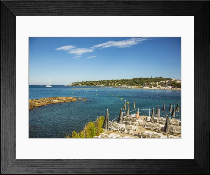 Framed Print : Beach in Antibes (Cap Antibes in background), Alpes-Maritimes, Provence-Alpes-Cote Framed Print : Beach in Antibes (Cap Antibes in background), Alpes-Maritimes, Provence-Alpes-Cote