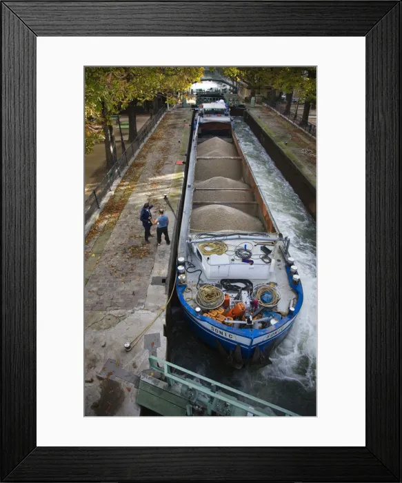 Framed Print : France, Paris, Canal St-Martin, barge in canal locks by the Quai de Jemmapes Framed Print : France, Paris, Canal St-Martin, barge in canal locks by the Quai de Jemmapes