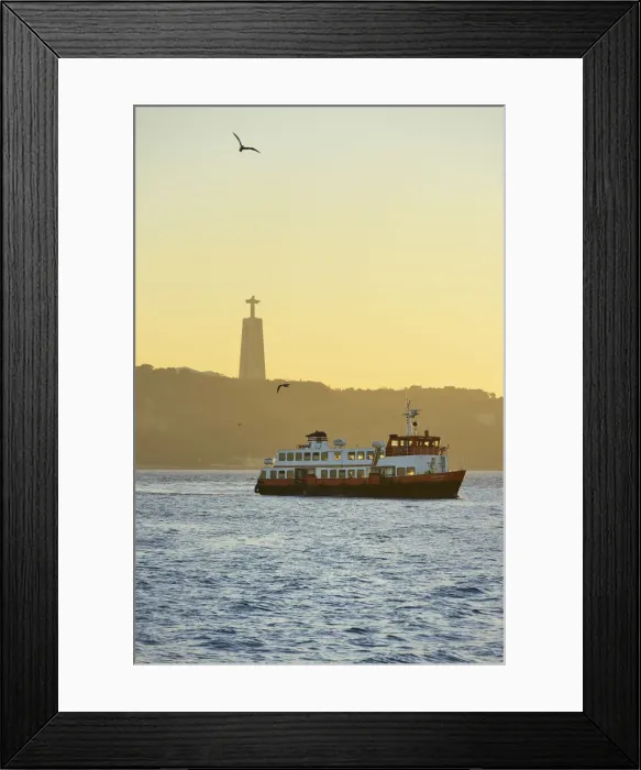 Framed Print : A traditional passenger boat (cacilheiro) crossing the Tagus river between Almada Framed Print : A traditional passenger boat (cacilheiro) crossing the Tagus river between Almada