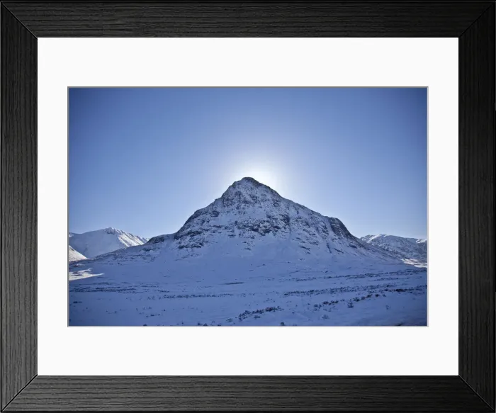 Framed Print : Glen Coe, Scotland. The sun hides behind Meall Mor in snow covered Glen Coe Framed Print : Glen Coe, Scotland. The sun hides behind Meall Mor in snow covered Glen Coe