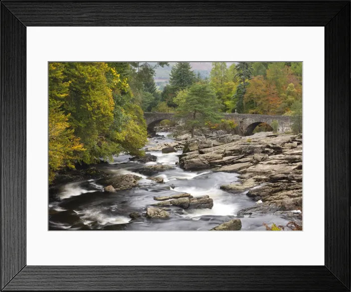 Framed Print : The Falls of Dochart and stone bridge surrounded by autumn foliage at Killin, Loch Lomond Framed Print : The Falls of Dochart and stone bridge surrounded by autumn foliage at Killin, Loch Lomond
