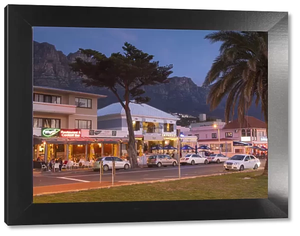 Restaurants in Camps Bay at dusk, Cape Town, Western Cape, South Africa
