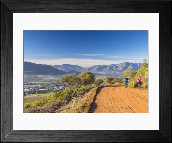 Framed Print : People cyclists passing through Paarl Valley, Paarl, Western Cape, South Africa Framed Print : People cyclists passing through Paarl Valley, Paarl, Western Cape, South Africa