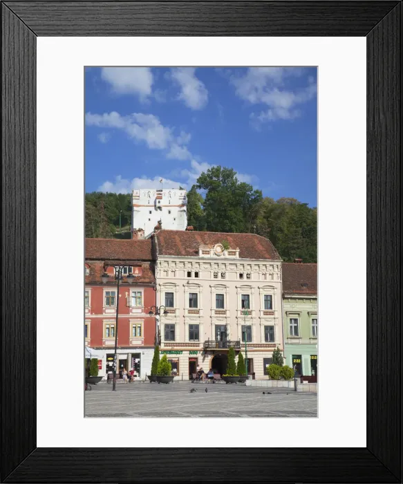 Framed Print : White Tower and buildings in Piata Sfatului, Brasov, Transylvania, Romania Framed Print : White Tower and buildings in Piata Sfatului, Brasov, Transylvania, Romania