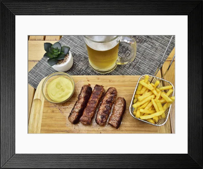 Framed Print : Mici, the delicious traditional sausages of Brasov, very tasty and spicy. Romania Framed Print : Mici, the delicious traditional sausages of Brasov, very tasty and spicy. Romania