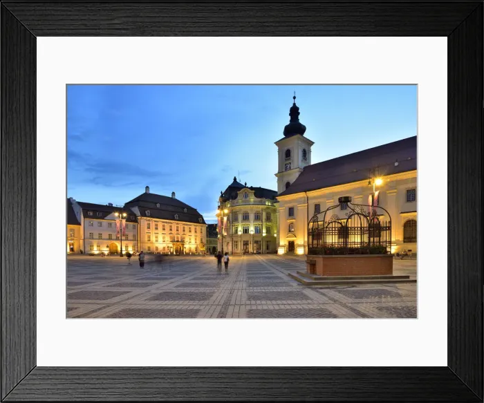 Framed Print : Piata Mare and the Holy Trinity Roman Catholic Church at dusk. Sibiu, Transylvania Framed Print : Piata Mare and the Holy Trinity Roman Catholic Church at dusk. Sibiu, Transylvania