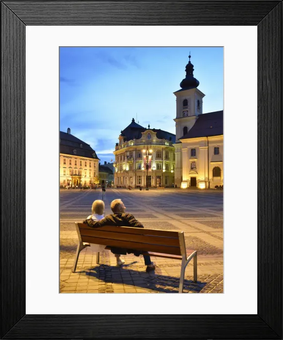 Framed Print : Moment of peace. Piata Mare and the Holy Trinity Roman Catholic Church at dusk. Sibiu Framed Print : Moment of peace. Piata Mare and the Holy Trinity Roman Catholic Church at dusk. Sibiu
