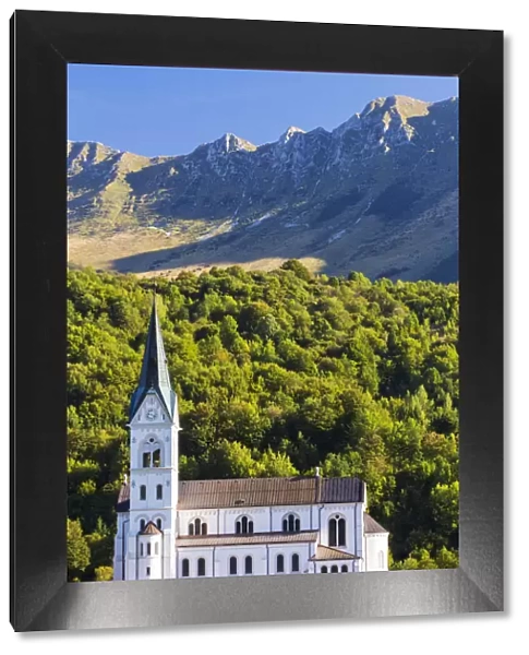 Slovenia, Goriska Region, Dreznica. The Church of the Sacred Heart, backdropped by