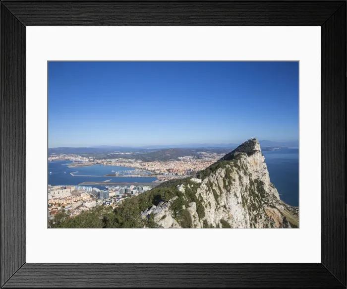 Framed Print : Gibraltar, View of Gibraltar rock, Gibraltar and in distance La Linea, Spain