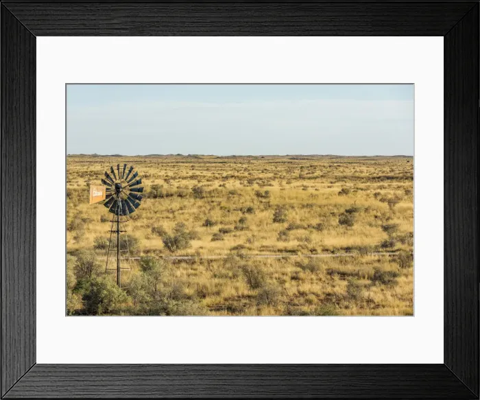 Framed Print : Africa, South Africa, Kalahari Transfrontier Park. A waterpump near to a water hole Framed Print : Africa, South Africa, Kalahari Transfrontier Park. A waterpump near to a water hole